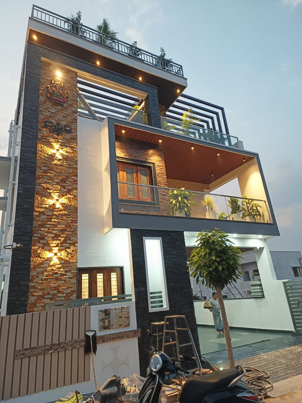 Night View - Dark Stone Pillar Facade