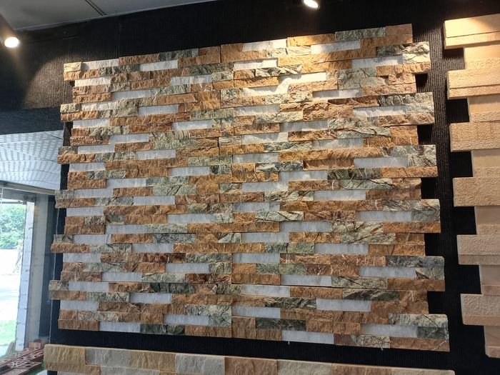 Brown white and green marble ledgestone sample